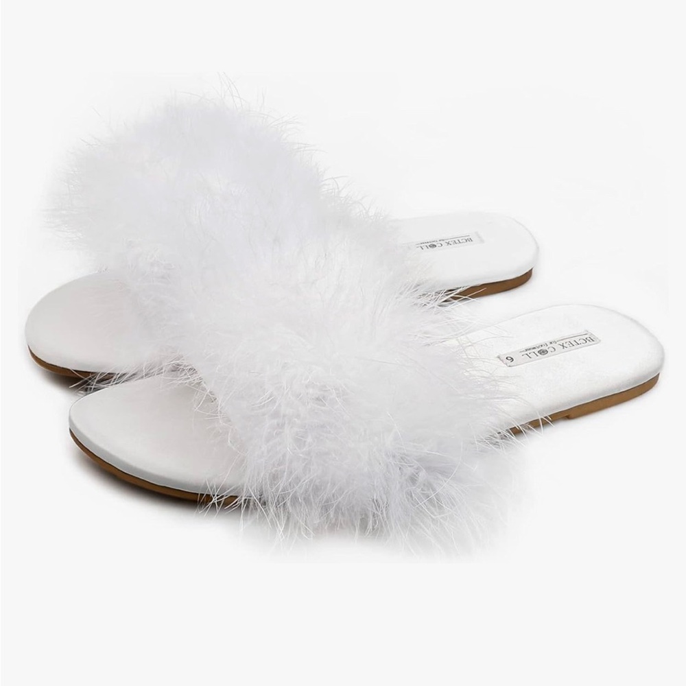 White Bridal feather slippers.